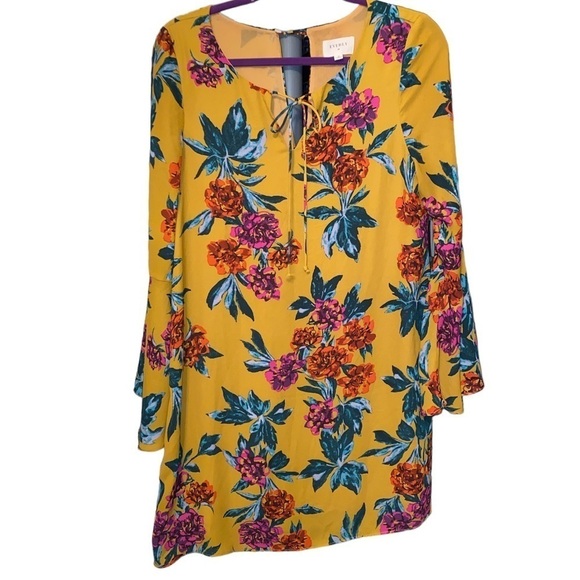 Everly Dresses & Skirts - Everly dress floral print long bell style sleeves keyhole opening lined Sz M